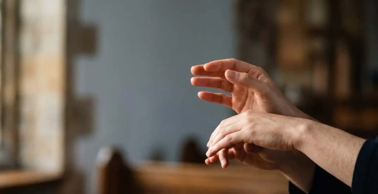 Close-up photograph of human hands making tactus gesture showing the natural pulse of medieval music performance